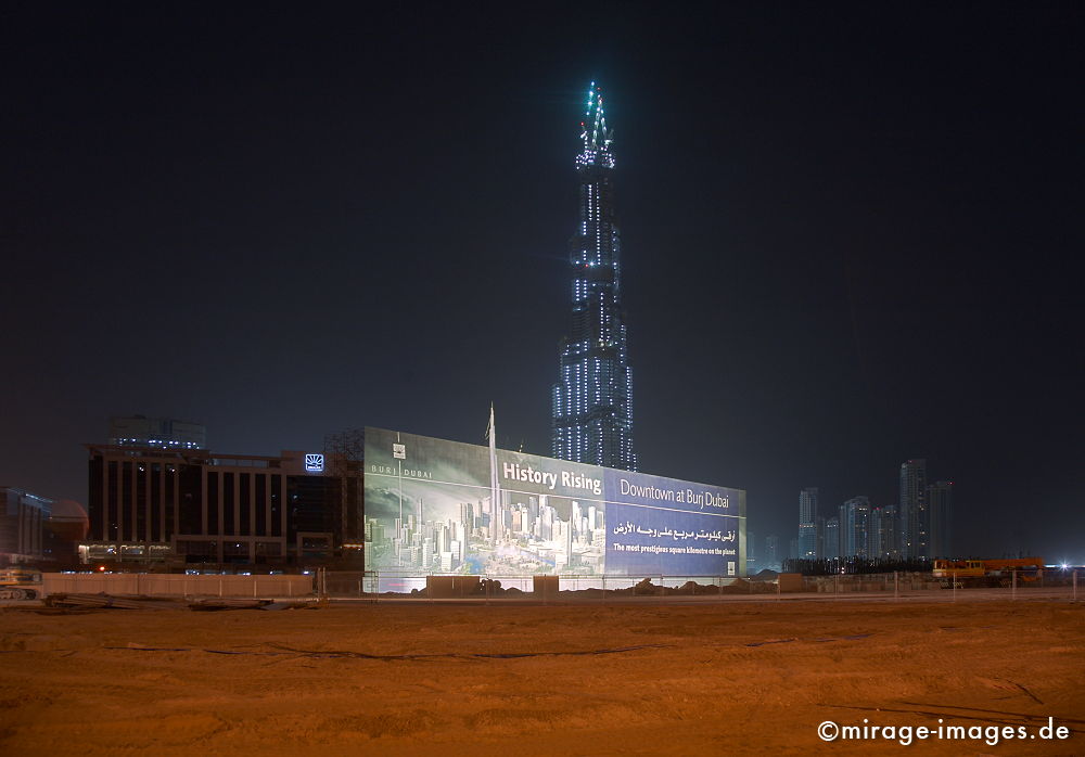 Burj Dubai
Schlüsselwörter: Architecture1, Boomtown, Beton, Hochhaus, Macht, Stärke, Einfluss, Baustelle, Arbeiter, gross, riesig, gigantisch, Stahl, Baukran, Großstadt, Lichter, gespentisch, Metropole, beleuchtet, Gebäude, Nacht, nachts, Mittlerer Osten, Geld, Scheichtum,